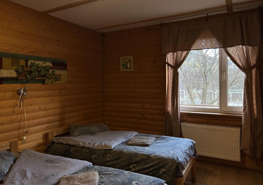 Postel nebo postele na pokoji v ubytování Готель Могул