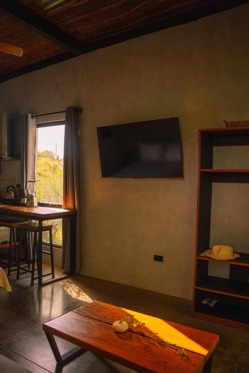 TV a/nebo společenská místnost v ubytování Casa Bodhi