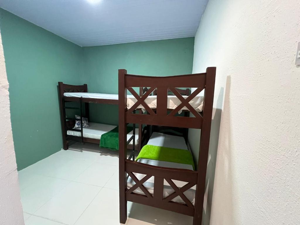 Postel nebo postele na pokoji v ubytování Hostel Ladeira dos 4 Cantos