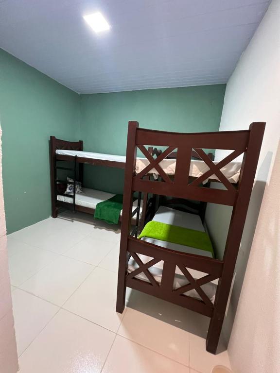 Postel nebo postele na pokoji v ubytování Hostel Ladeira dos 4 Cantos