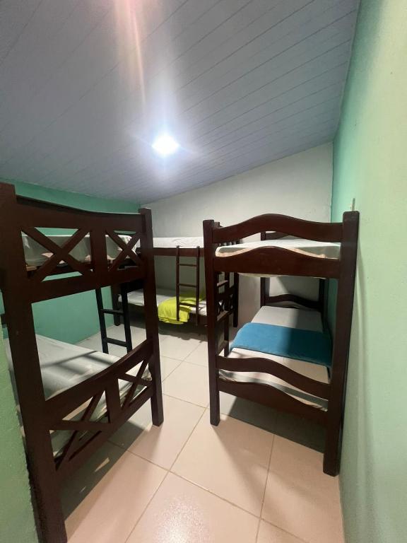 Postel nebo postele na pokoji v ubytování Hostel Ladeira dos 4 Cantos
