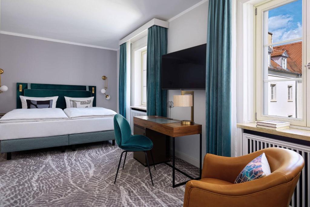 Ένα ή περισσότερα κρεβάτια σε δωμάτιο στο Hotel Elephant Weimar, Autograph Collection