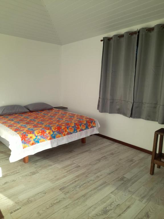Postel nebo postele na pokoji v ubytování Te Mana Lodge iti