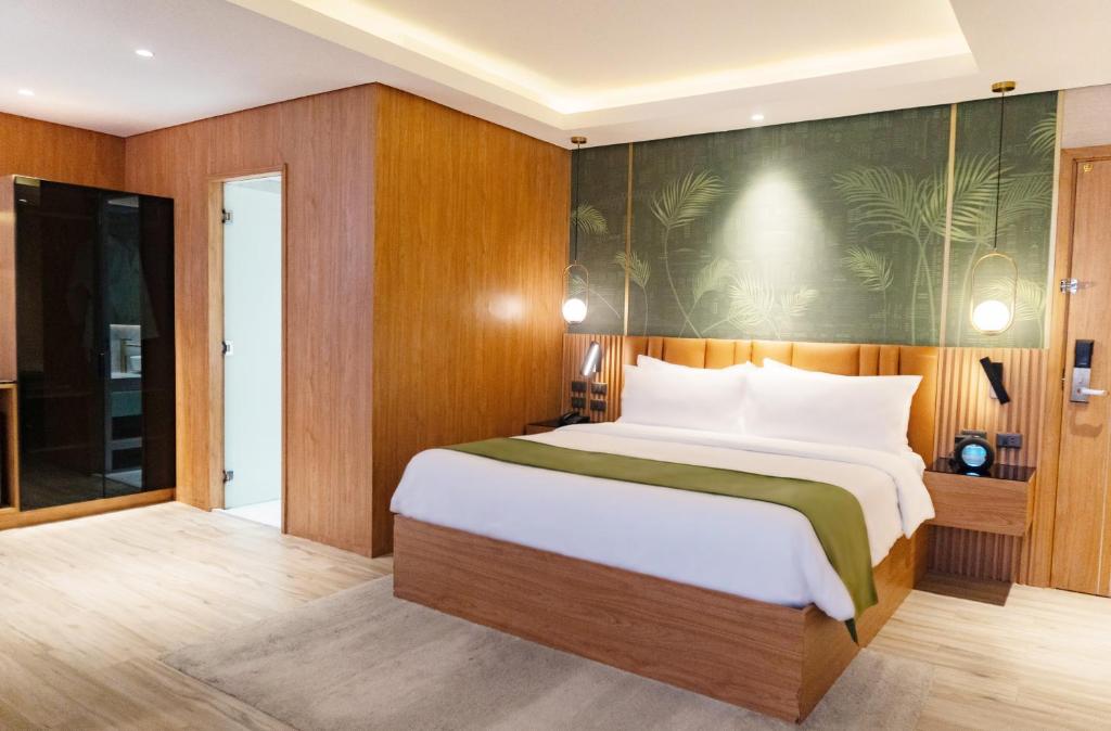 Voodi või voodid majutusasutuse Ironwood Hotel toas
