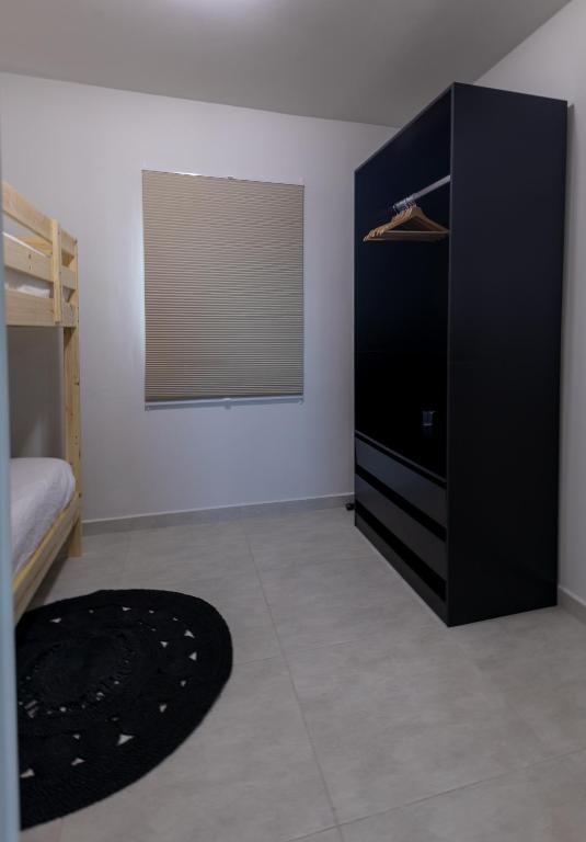 Postel nebo postele na pokoji v ubytování Kindvriendelijke 3 slaapkamer appartementen met zwembad, tropische tuin en vlakbij stranden