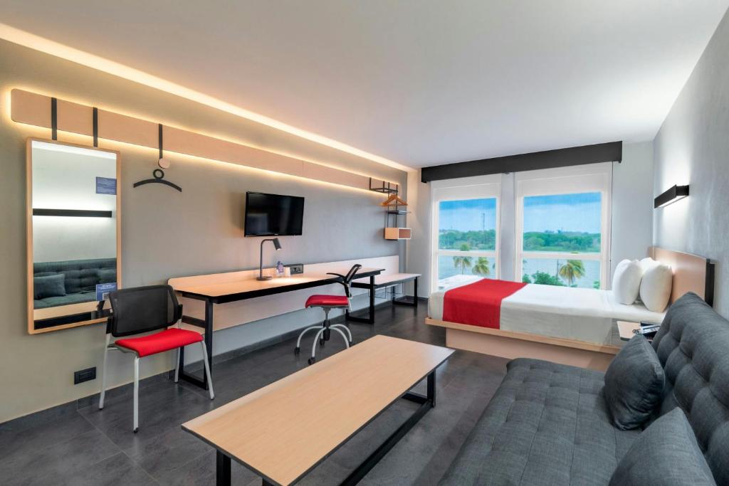 Letto o letti in una camera di City Express by Marriott Tuxpan