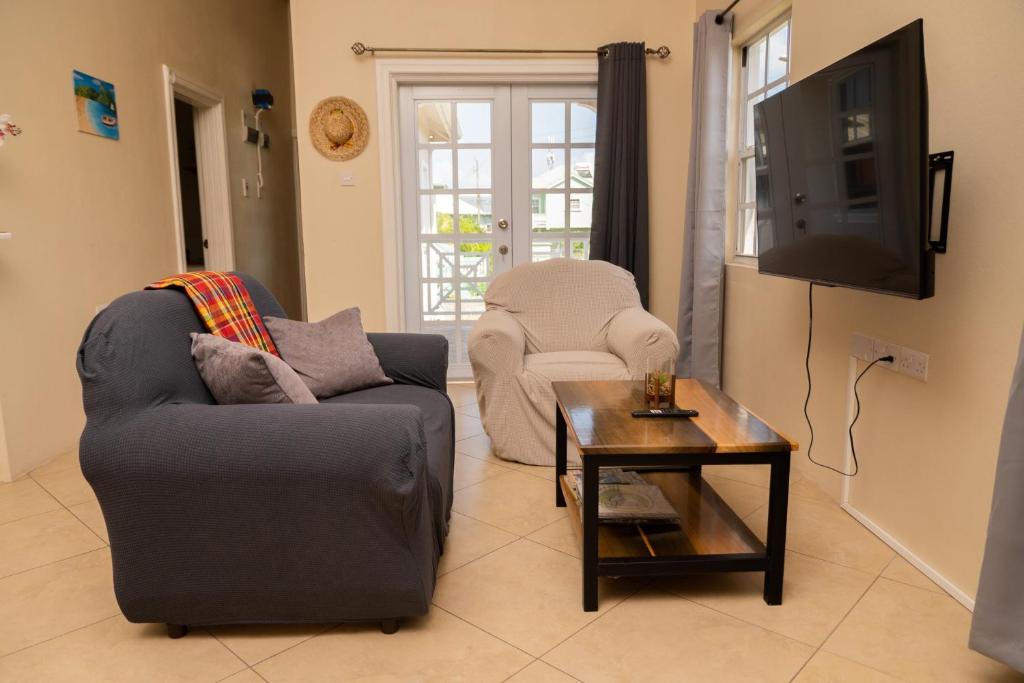 TV a/nebo společenská místnost v ubytování La Gentillesse Apartments - Modern, Comfortable and Quiet
