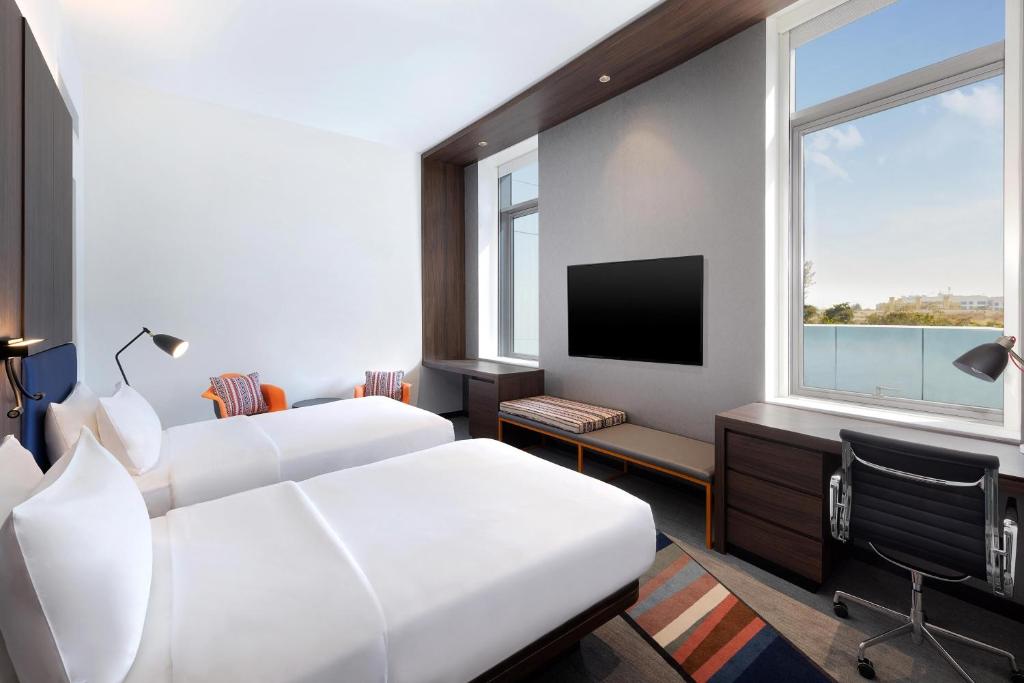 
Aloft Guest Room with 2 Single Beds - Complimentary Transfer to Dubai Mall / Burj Khalifa, Burjuman & Kite Beach
