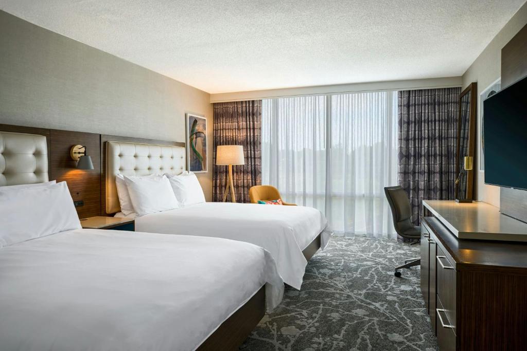 Postel nebo postele na pokoji v ubytování Renaissance Meadowlands Hotel