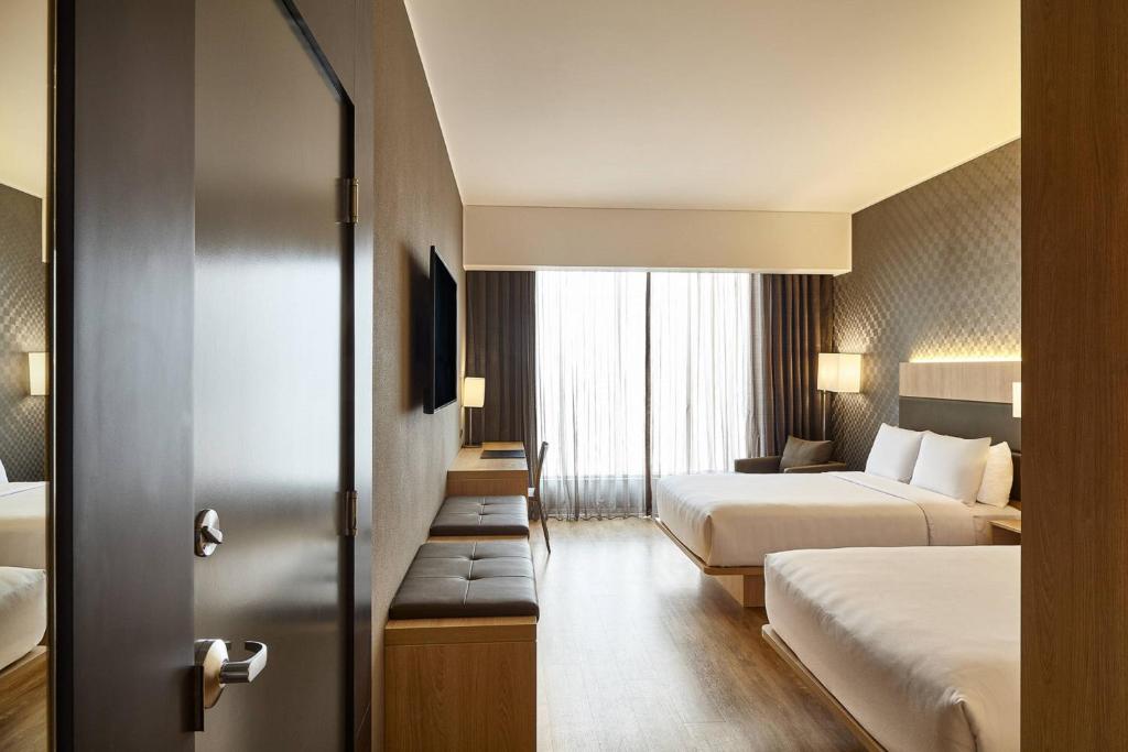 Postel nebo postele na pokoji v ubytování AC Hotel by Marriott Lima Miraflores