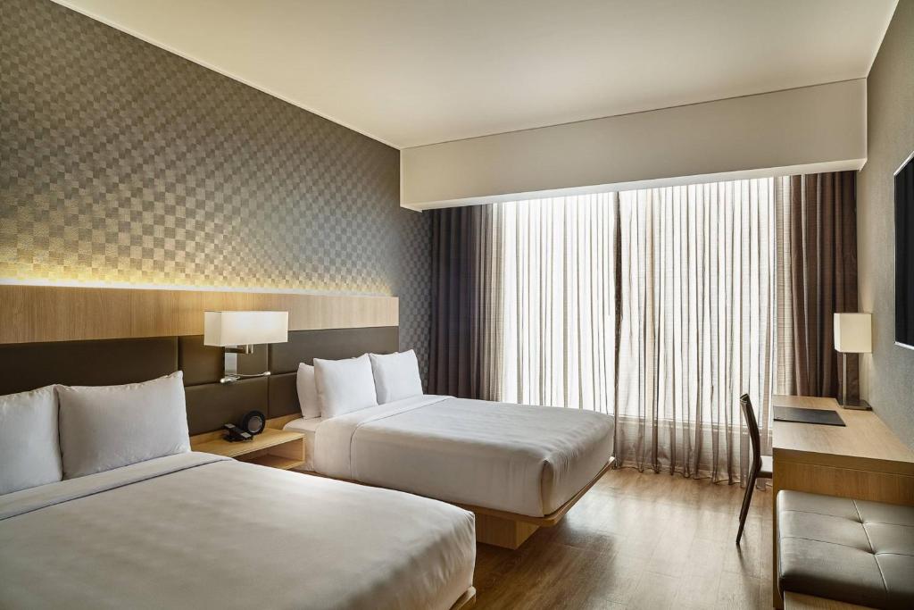 Postel nebo postele na pokoji v ubytování AC Hotel by Marriott Lima Miraflores