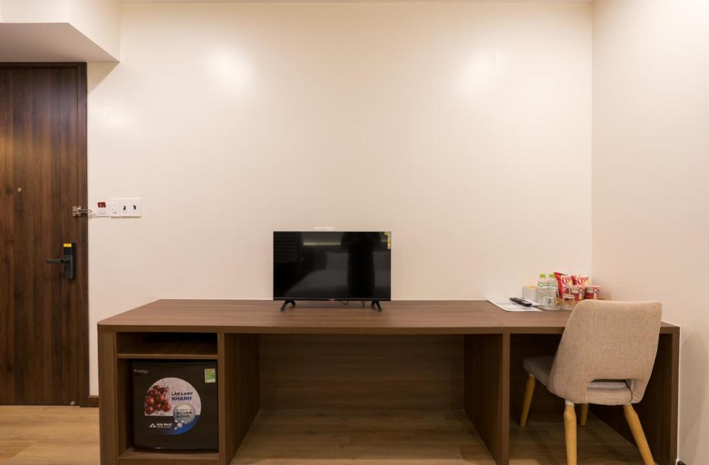 TV a/nebo společenská místnost v ubytování Adalie Pleiku Hotel