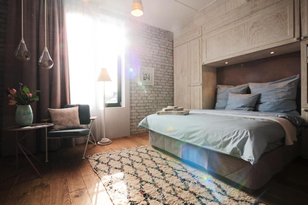 Cama ou camas em um quarto em Libertine Lindenberg
