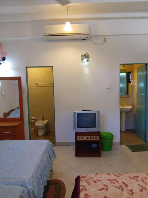 Postel nebo postele na pokoji v ubytování Hotel Shalini