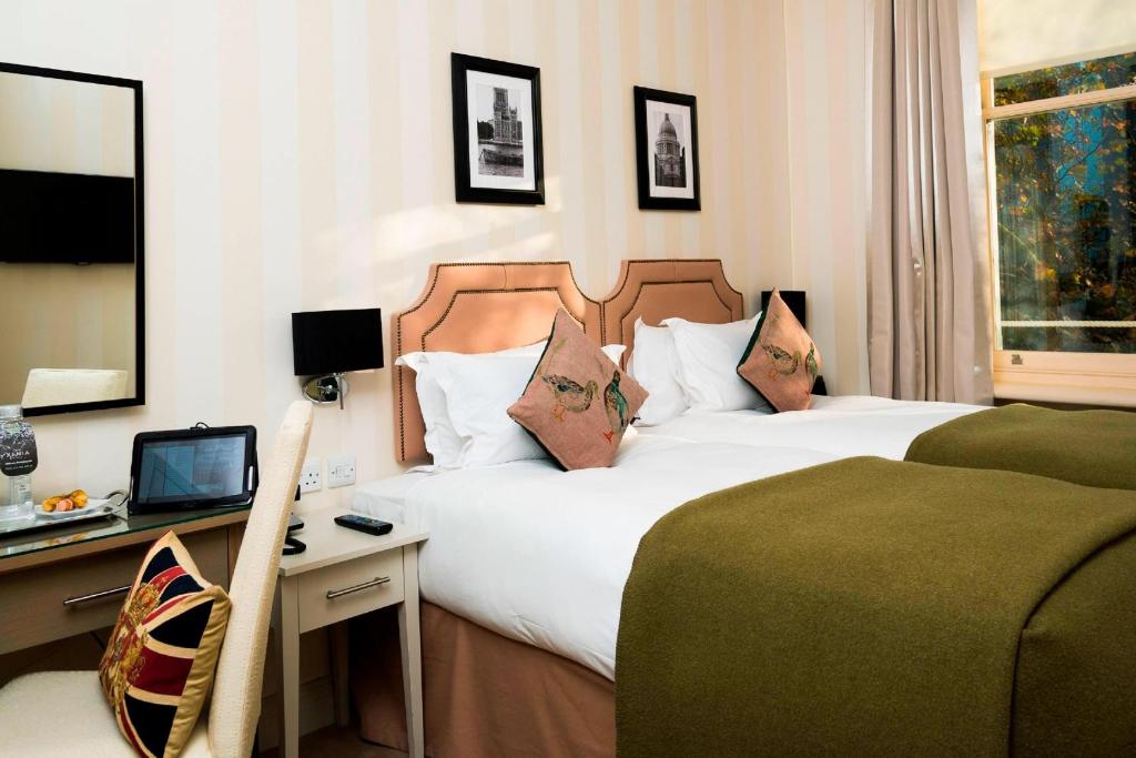 Postel nebo postele na pokoji v ubytování Hotel Xenia - Autograph Collection