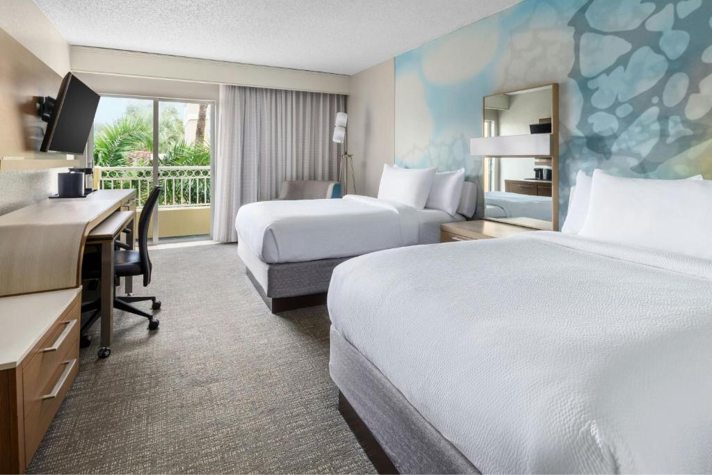 Postel nebo postele na pokoji v ubytování Courtyard by Marriott Fort Lauderdale North/Cypress Creek