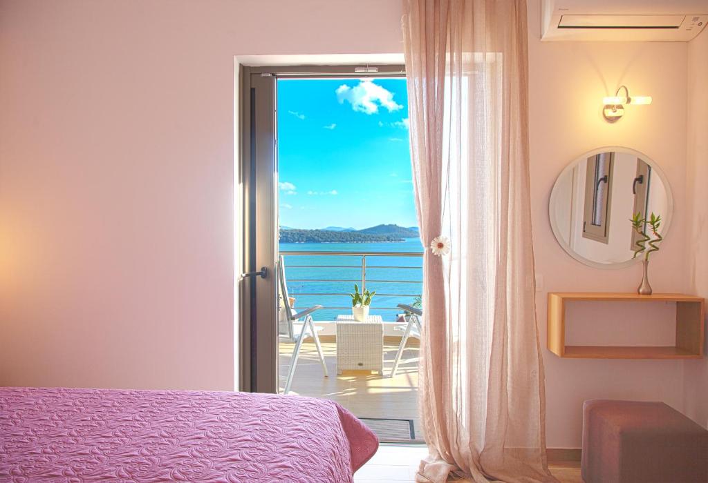 A bed or beds in a room at Villa Maria PF