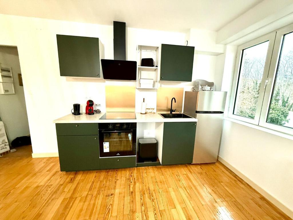 Η κουζίνα ή μικρή κουζίνα στο Au cœur du vignoble