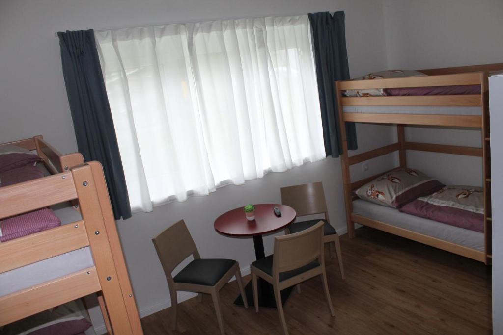 Postel nebo postele na pokoji v ubytování Ferienwohnungen Hebalm