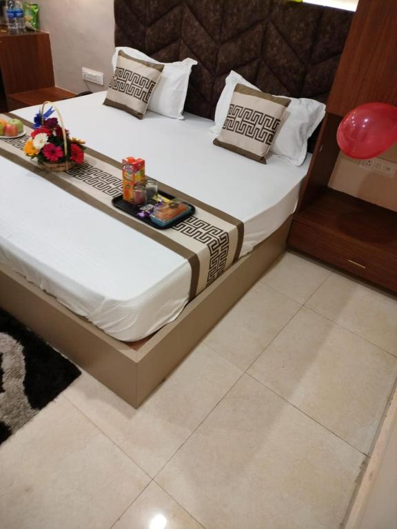 Postel nebo postele na pokoji v ubytování Hotel Grand Ganga