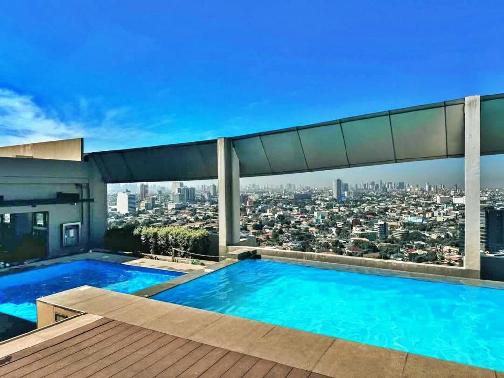Bazén v ubytování Vinia Residences by Filinvest nebo v jeho okolí