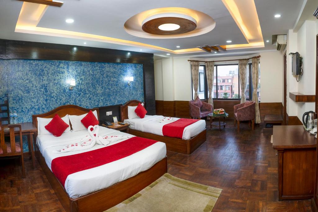 Postel nebo postele na pokoji v ubytování Samsara Boutique Hotel