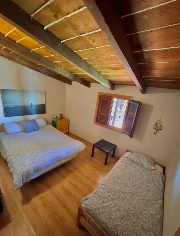 Cama o camas de una habitación en Adeje - TwinFin Hostel & Surf Yoga Camp