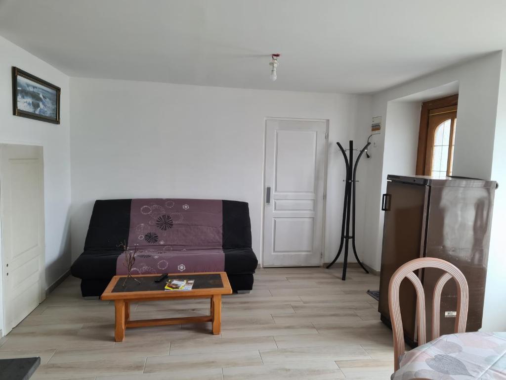 Posezení v ubytování Appartement T2 spacieux à FREHEL
