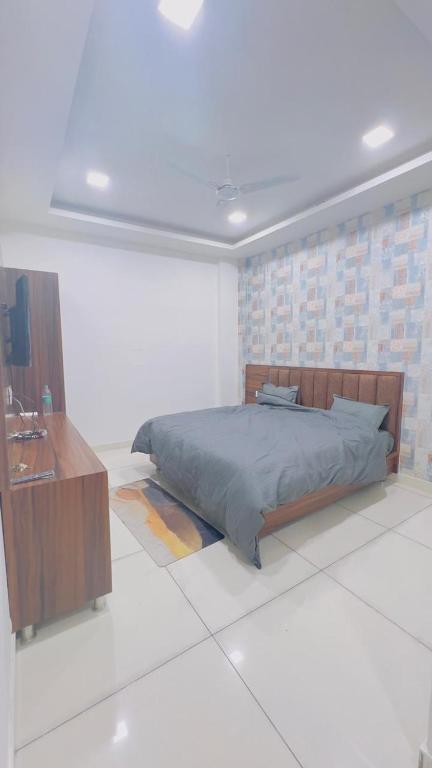 Postel nebo postele na pokoji v ubytování Hotel RUTBA