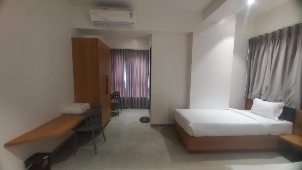Postel nebo postele na pokoji v ubytování Hotel Elite