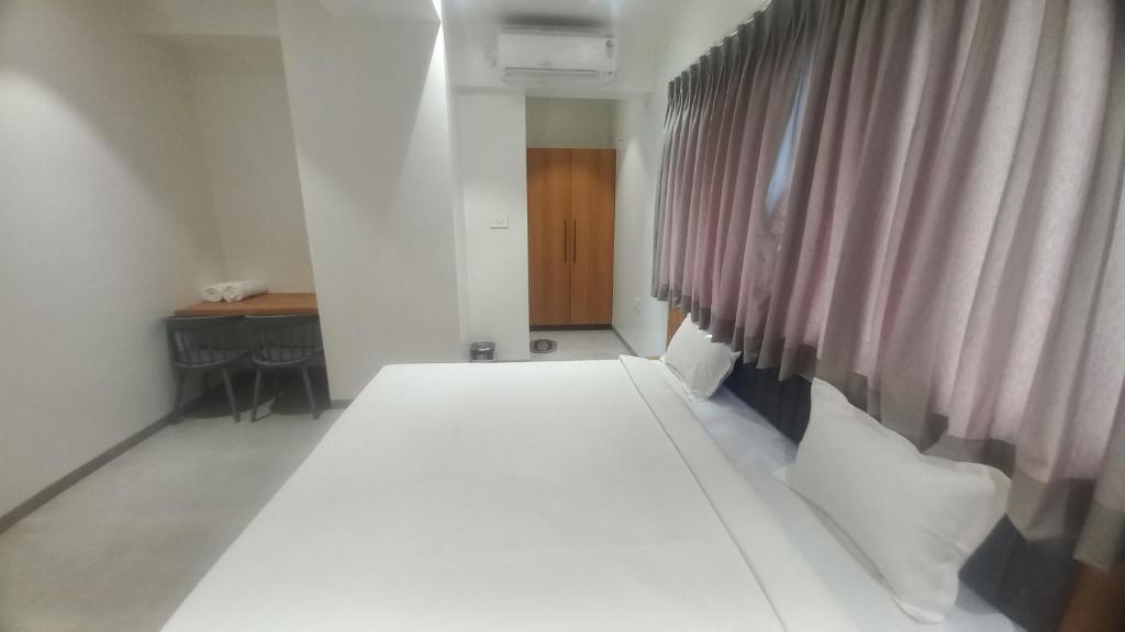 Postel nebo postele na pokoji v ubytování Hotel Elite