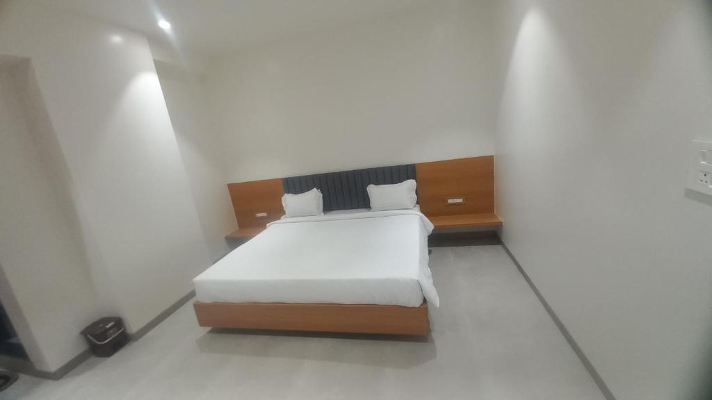 Postel nebo postele na pokoji v ubytování Hotel Elite