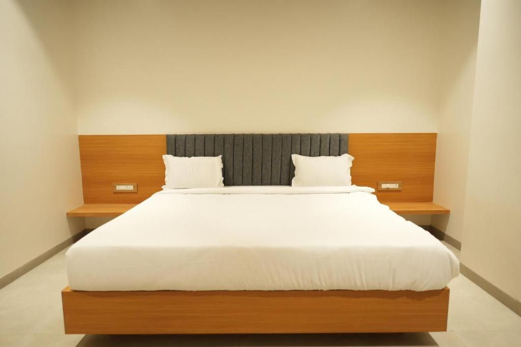 Postel nebo postele na pokoji v ubytování Hotel Elite