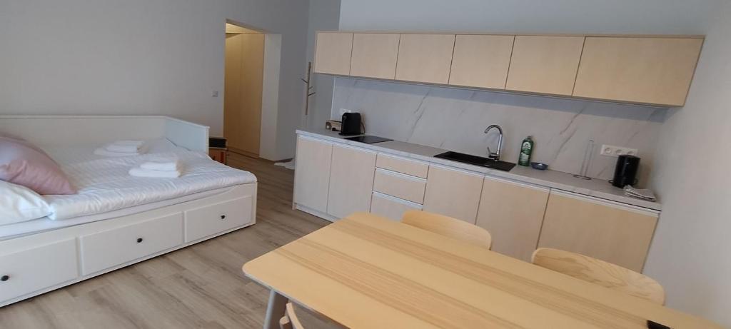 Postel nebo postele na pokoji v ubytování Vila Krupička