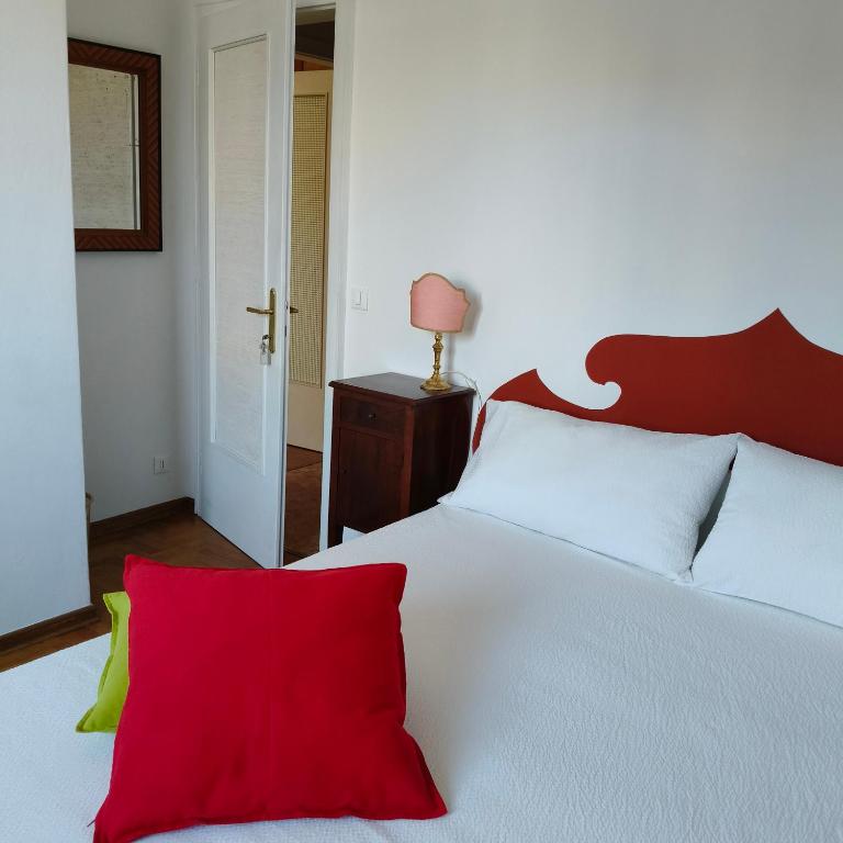 Postel nebo postele na pokoji v ubytování Radetzky Rooms