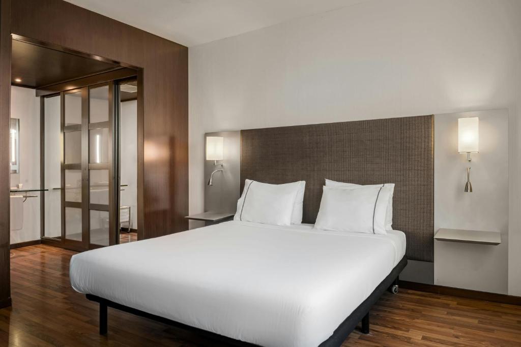 Postel nebo postele na pokoji v ubytování AC Hotel by Marriott Pisa