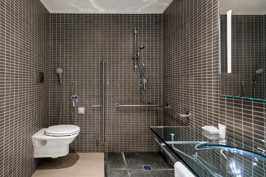 Koupelna v ubytování AC Hotel by Marriott Pisa