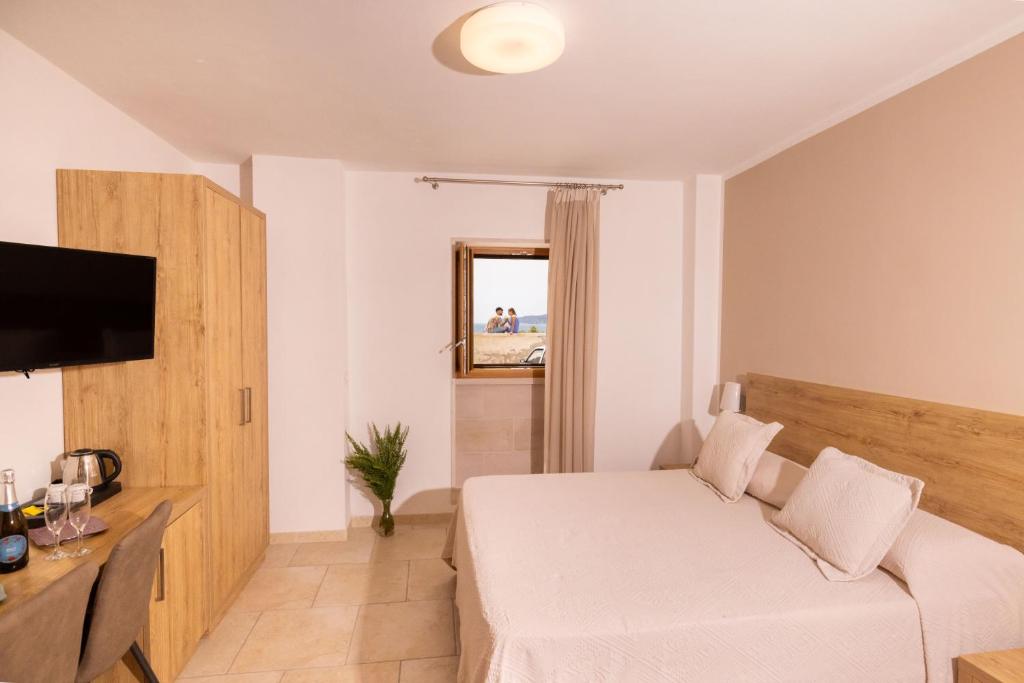 TV a/nebo společenská místnost v ubytování Hotel Punta San Francesco