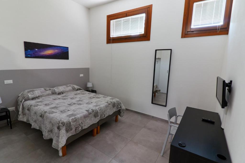 TV a/nebo společenská místnost v ubytování Agriturismo Oasi Bettella