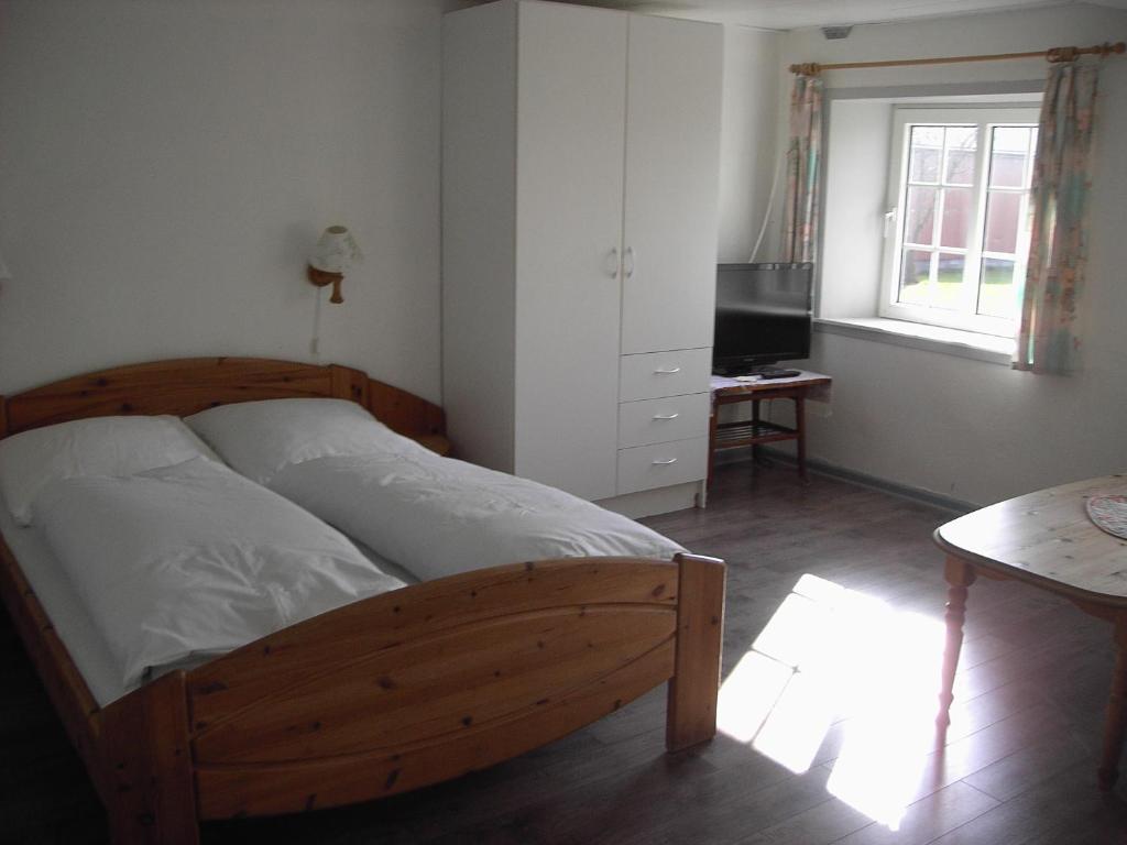 Postel nebo postele na pokoji v ubytování Astrupgaard Farm Holiday