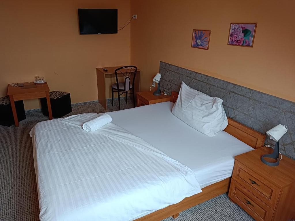 Postel nebo postele na pokoji v ubytování Toscca
