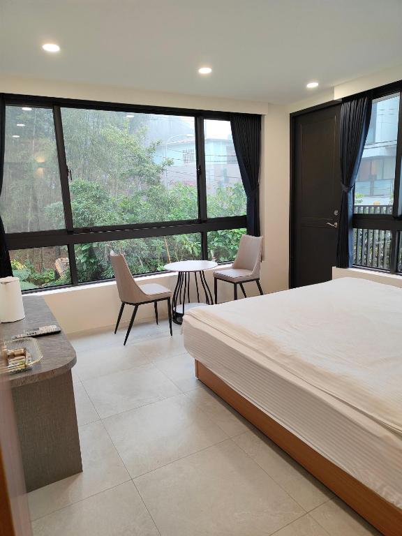 Postel nebo postele na pokoji v ubytování Xitou Tianpin Homestay
