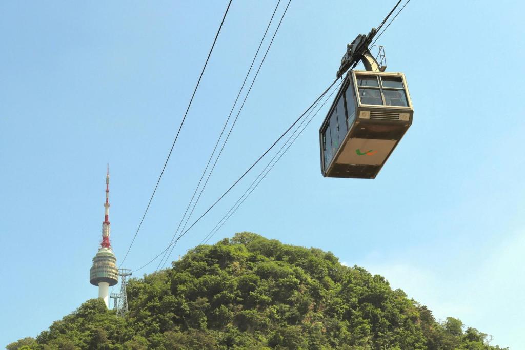 a cable car in front of the berlin tv tower at Aloft Seoul Myeongdong in Seoul