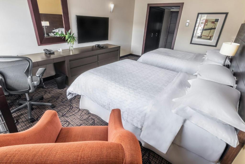 Postel nebo postele na pokoji v ubytování Sheraton Quito