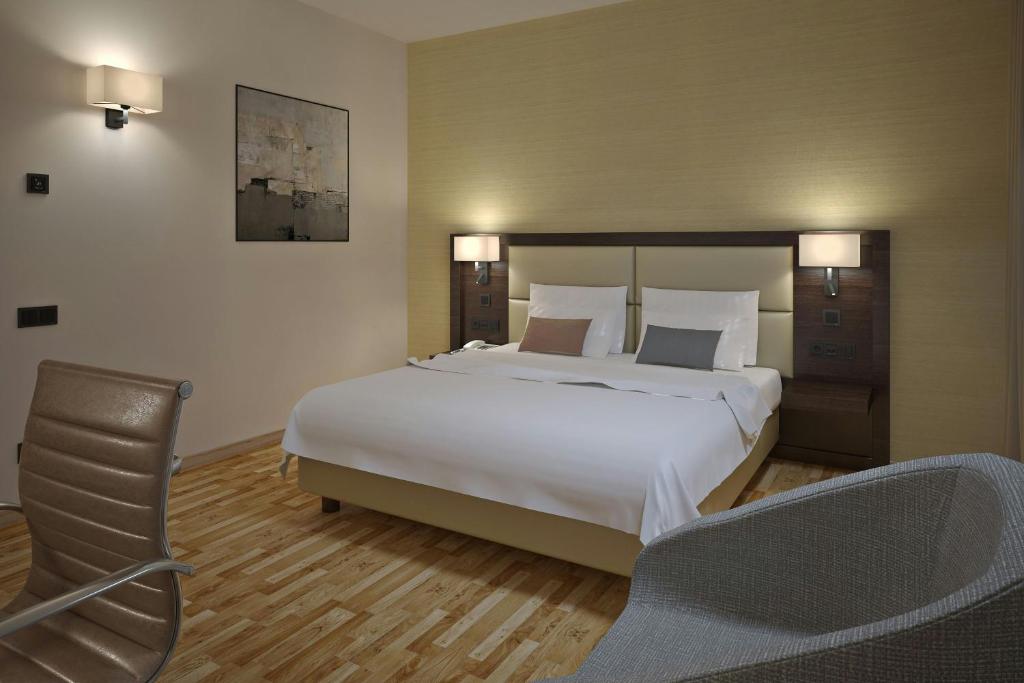 Postel nebo postele na pokoji v ubytování AC Hotel by Marriott Milan Sesto