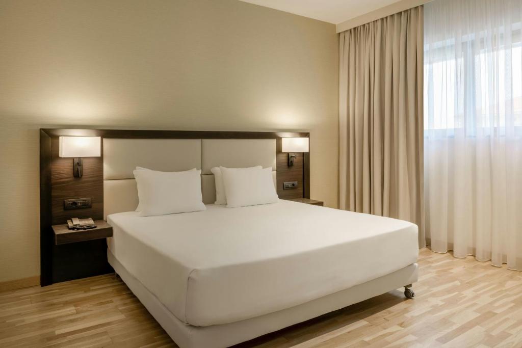 Postel nebo postele na pokoji v ubytování AC Hotel by Marriott Milan Sesto