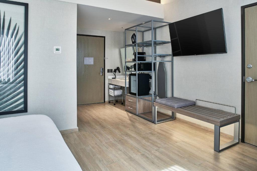 TV a/nebo společenská místnost v ubytování AC Hotel by Marriott Veracruz