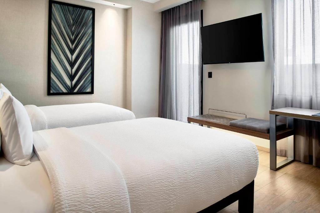 TV a/nebo společenská místnost v ubytování AC Hotel by Marriott Veracruz
