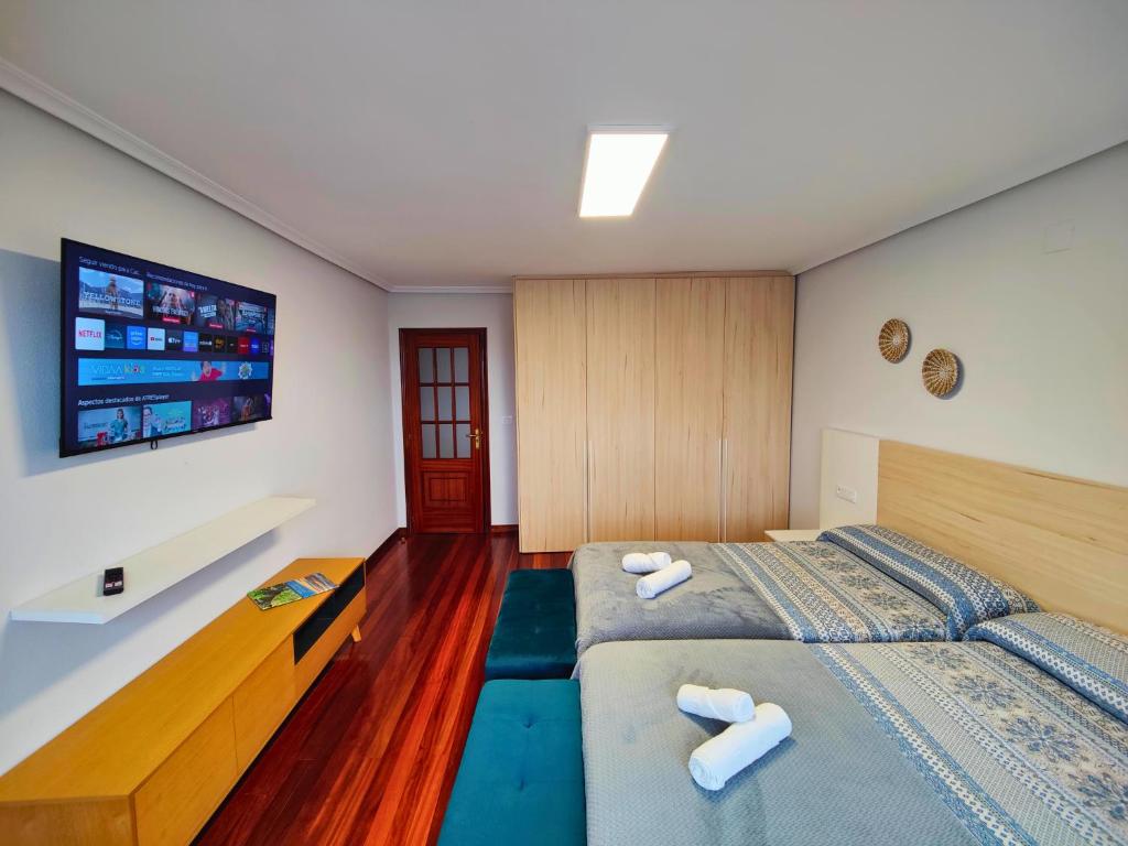 Postel nebo postele na pokoji v ubytování Casa-Nova Centro