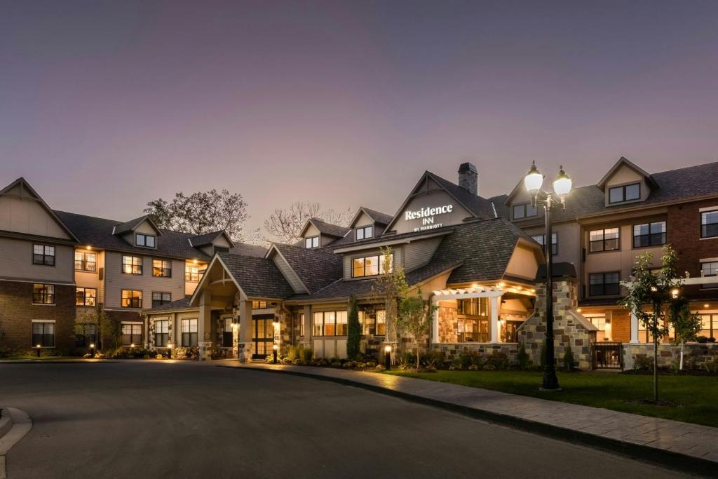 a rendering of a hotel at night at Residence Inn by Marriott Milwaukee Brookfield in Brookfield